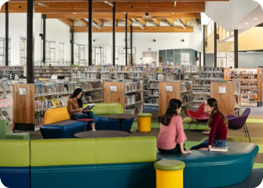 A group of children in a library.