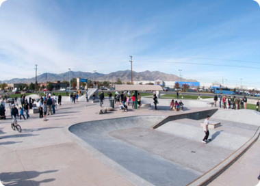 A skate park with people.