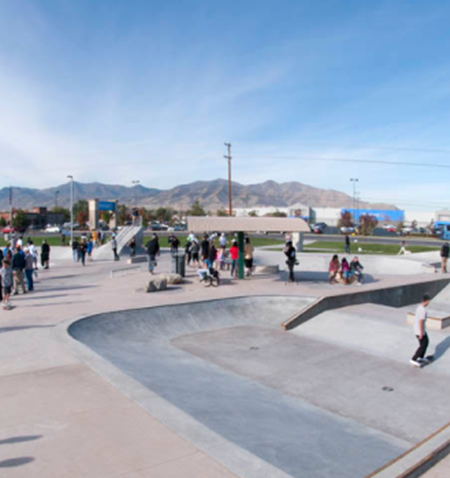 A skate park with people.