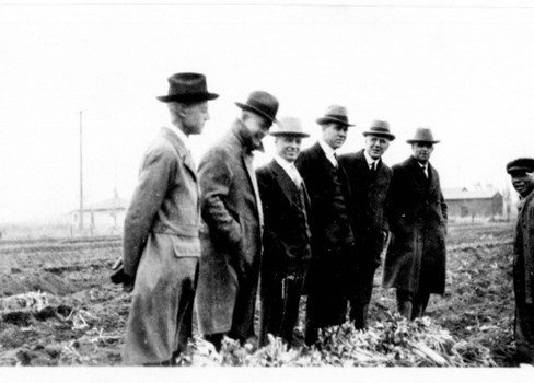 A group of men in hats.