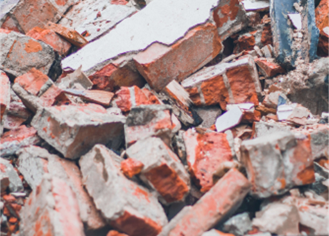 A pile of red and white bricks.