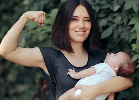 Nicoleta Ionescu holding a baby.
