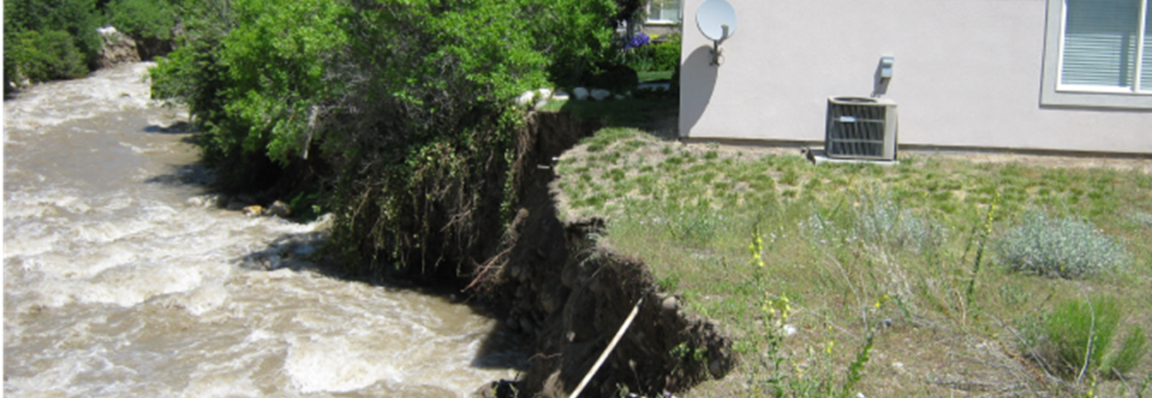 Eroded streambank caused by flooding.