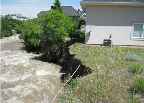 Eroded streambank caused by flooding.