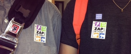 people wearing zap stickers