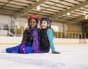 A couple of girls on ice.