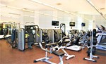 A gym with exercise equipment.